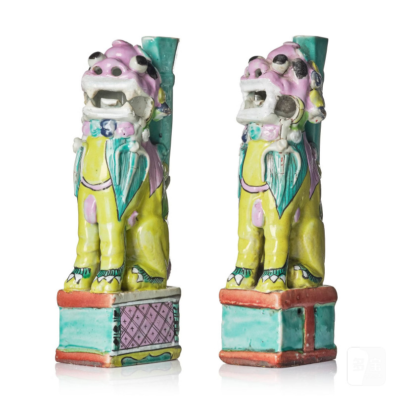 A pair of famille rose 'buddhist lion' joss stick holders,
